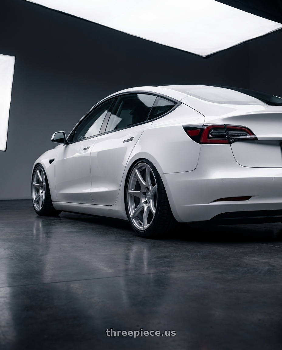 2023 Tesla Model 3 with Kansei K11S Tandem 5x114.3 19x9.5 12 Hyper Silver wheels rear three quarter view slight stretch tires