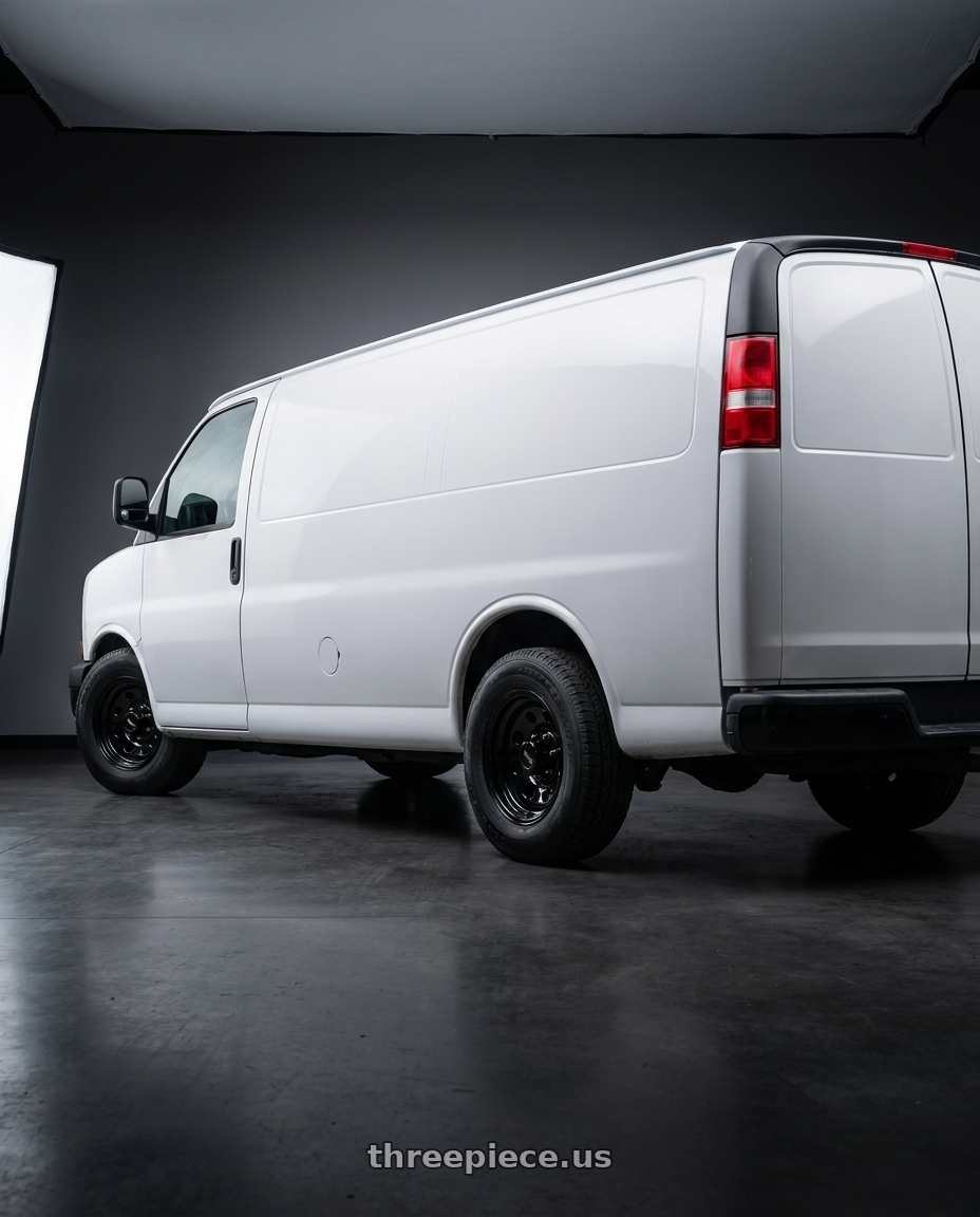 2012 Chevy Express with Vision HD 85H 8x165.1 16x7+0 Gloss Black wheels rear three quarter view slight stretch tires