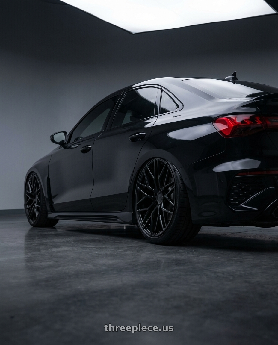 2022 Audi RS3 8Y with Avant Garde Wheels M520R 5X112 19x9.5 +40 Gloss Black wheels rear three quarter view slight stretch tires