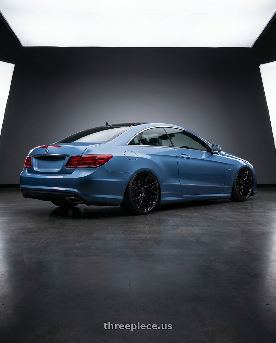 2014 Mercedes-Benz E-Class Coupe C207 with Avant Garde Wheels M520R 5X112 20x10 +35 Gloss Black wheels rear three quarter view slight stretch tires