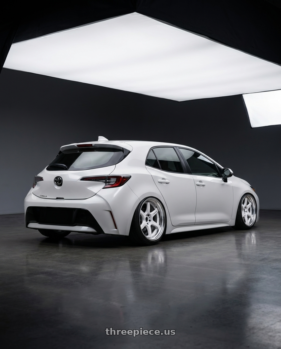 2021 Toyota Corolla hatchback  with Work T7r 2P 5x100 18x10.0 +18 WHITE wheels rear three quarter view slight stretch tires