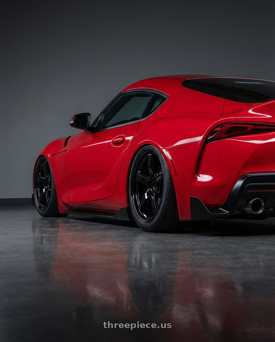 2023 Toyota GR Supra with Gram Lights 57CR 5x112 19x10.5+35 Glossy Black wheels rear three quarter view slight stretch tires