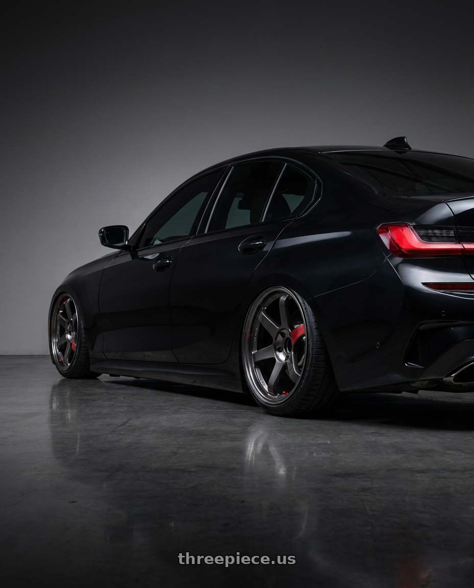 2020 BMW m340i with Volk Racing TE37 SL 5x114.3 18x9.5+35 wheels rear three quarter view slight stretch tires
