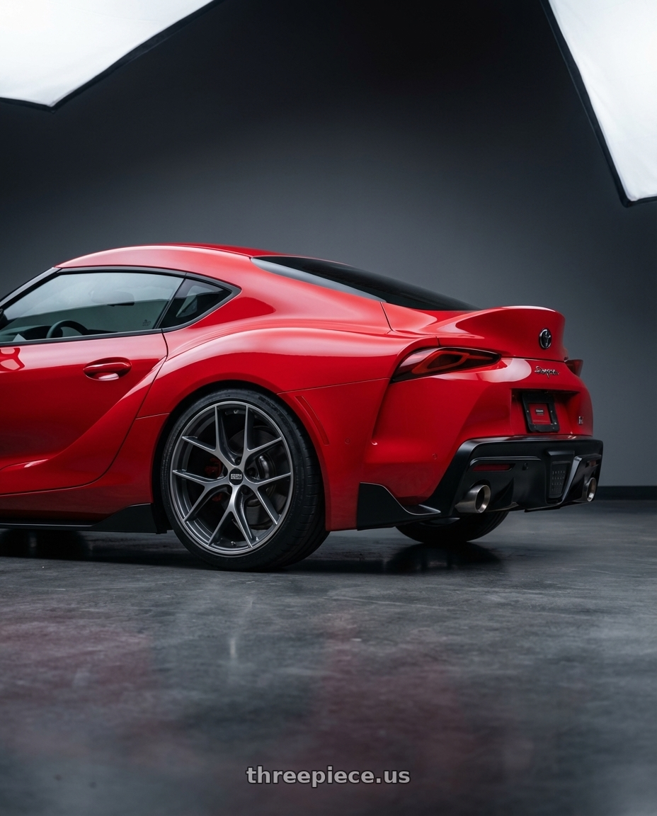 2023 Toyota GR Supra with BBS CC-R 5x112 19x9.0+42 Graphite w/ Diamond Cut Face wheels rear three quarter view square tires